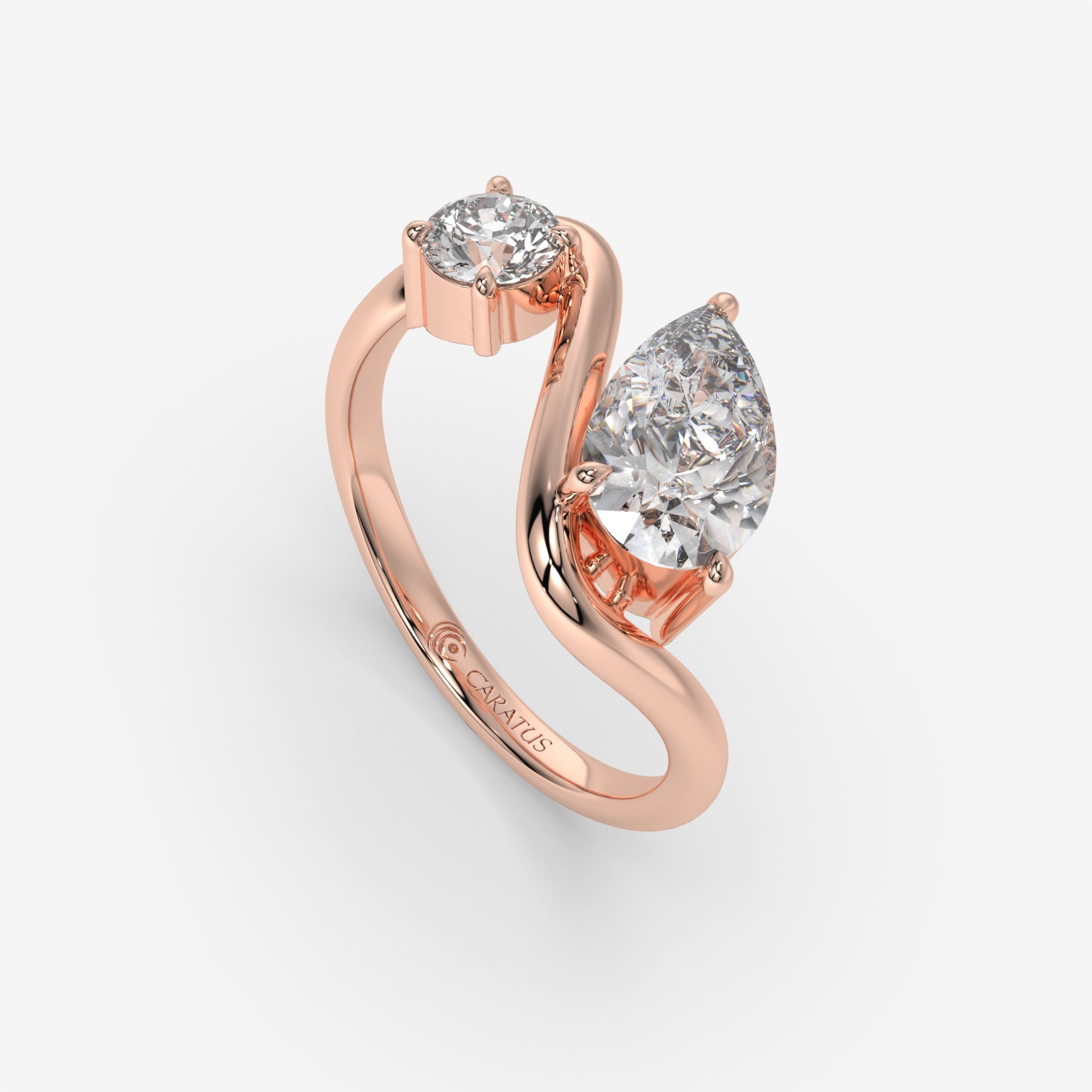 Intertwined Pear-Shaped Diamond Rose Gold Ring with Round Diamond