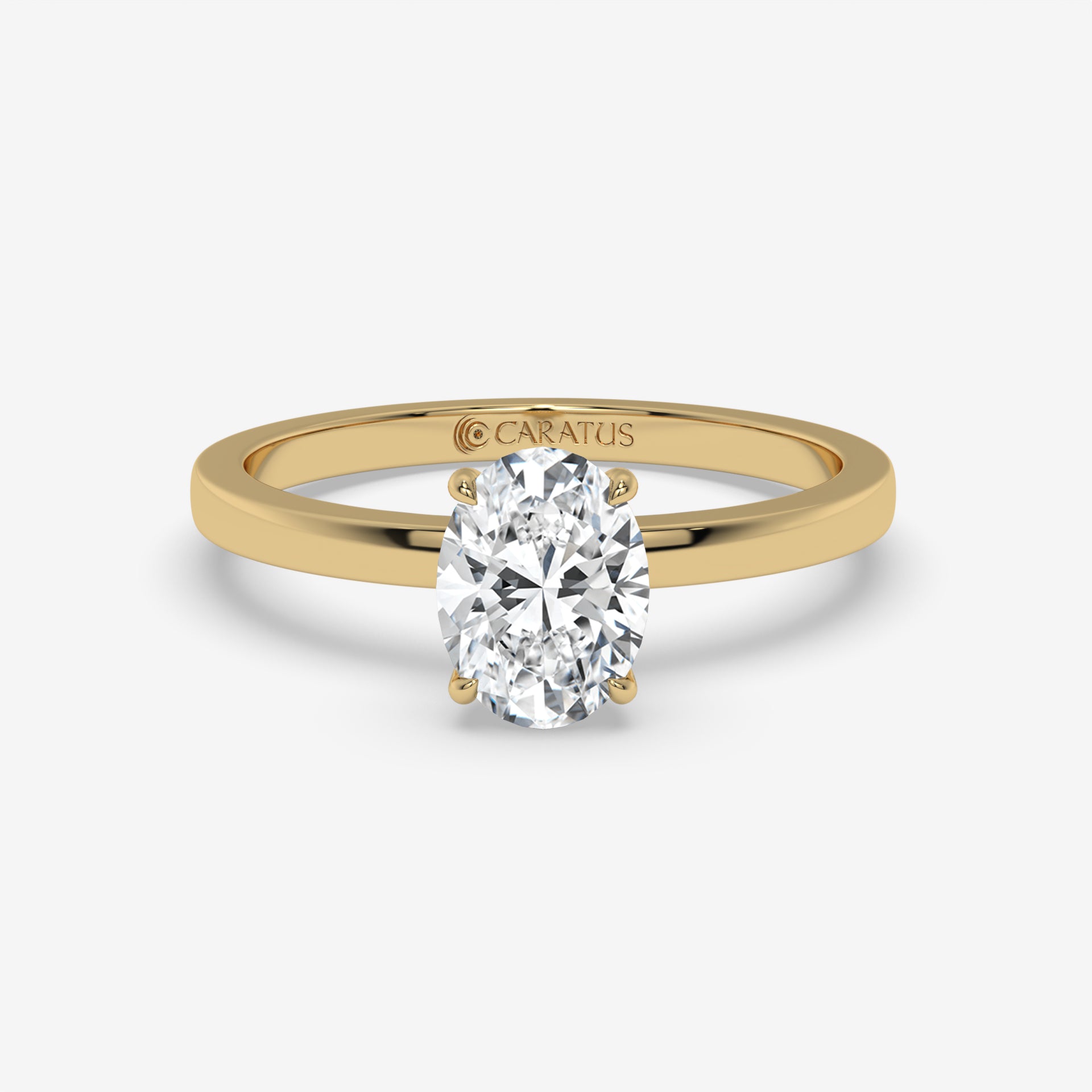 Yellow Gold Oval Diamond Ring with Round Side Stones