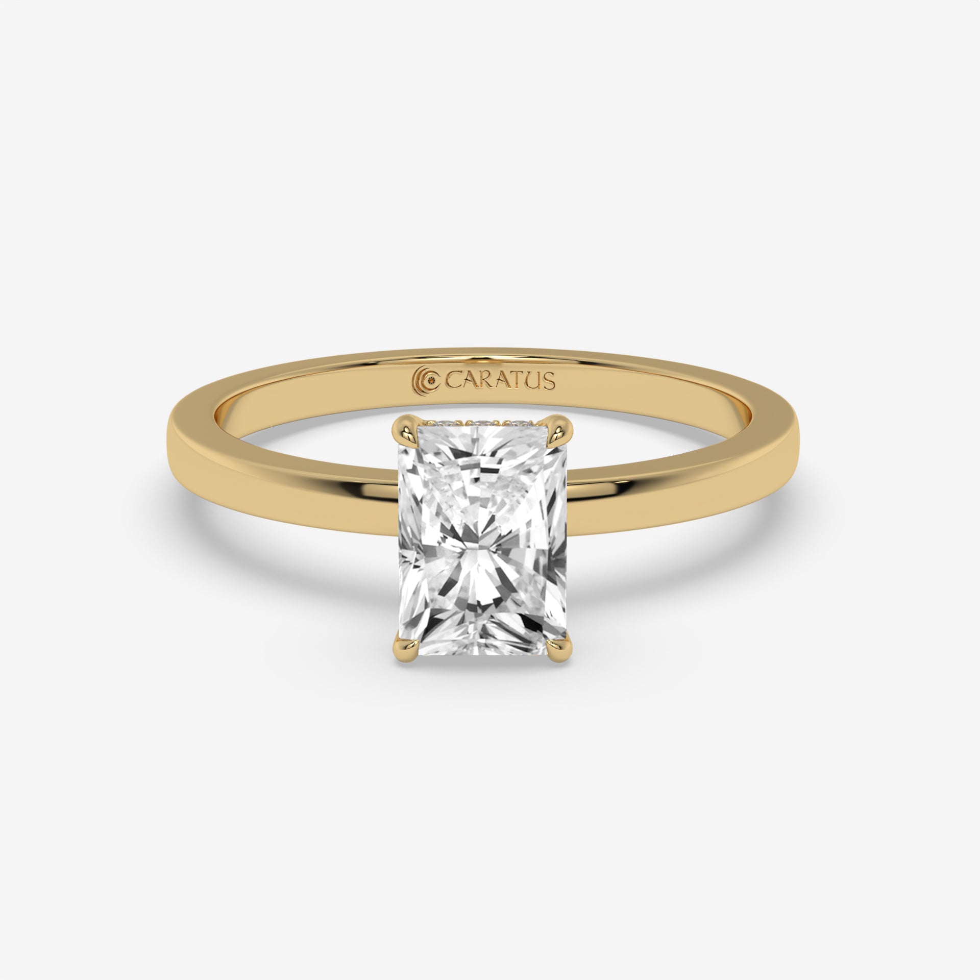 Radiant-cut Diamond Rose Gold Ring with Round Side Diamonds