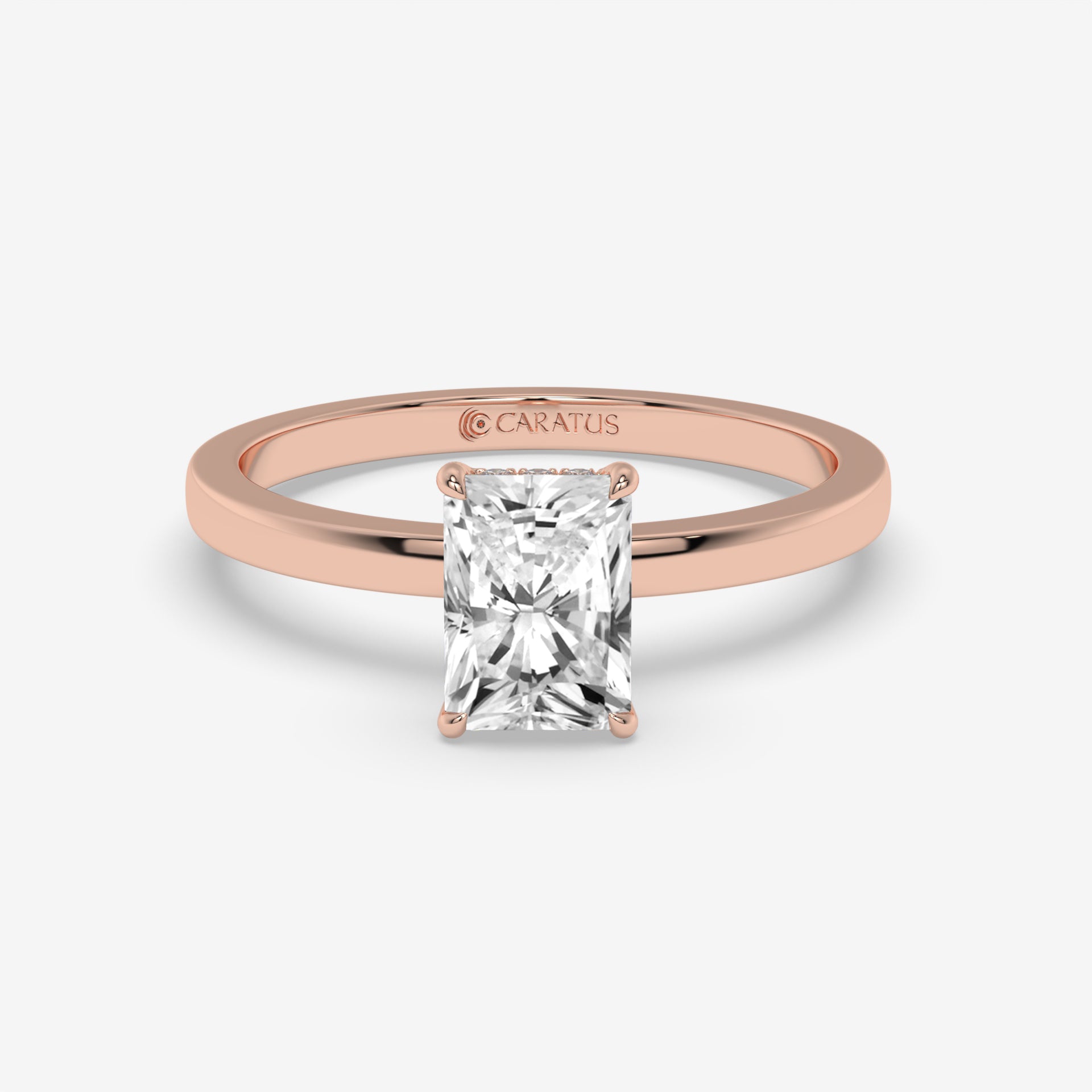Radiant-cut Diamond Rose Gold Ring with Round Side Diamonds