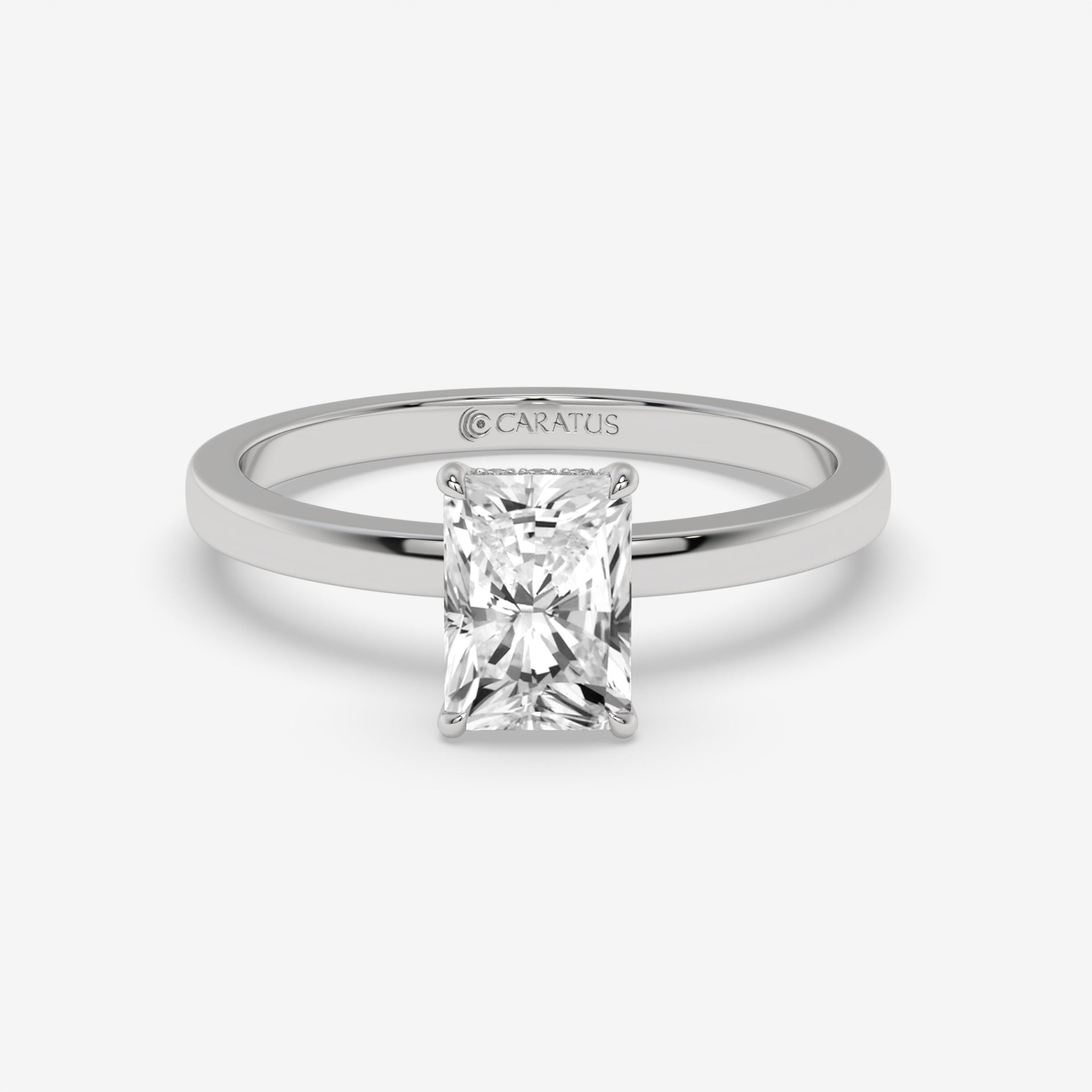 Radiant-cut Diamond Rose Gold Ring with Round Side Diamonds