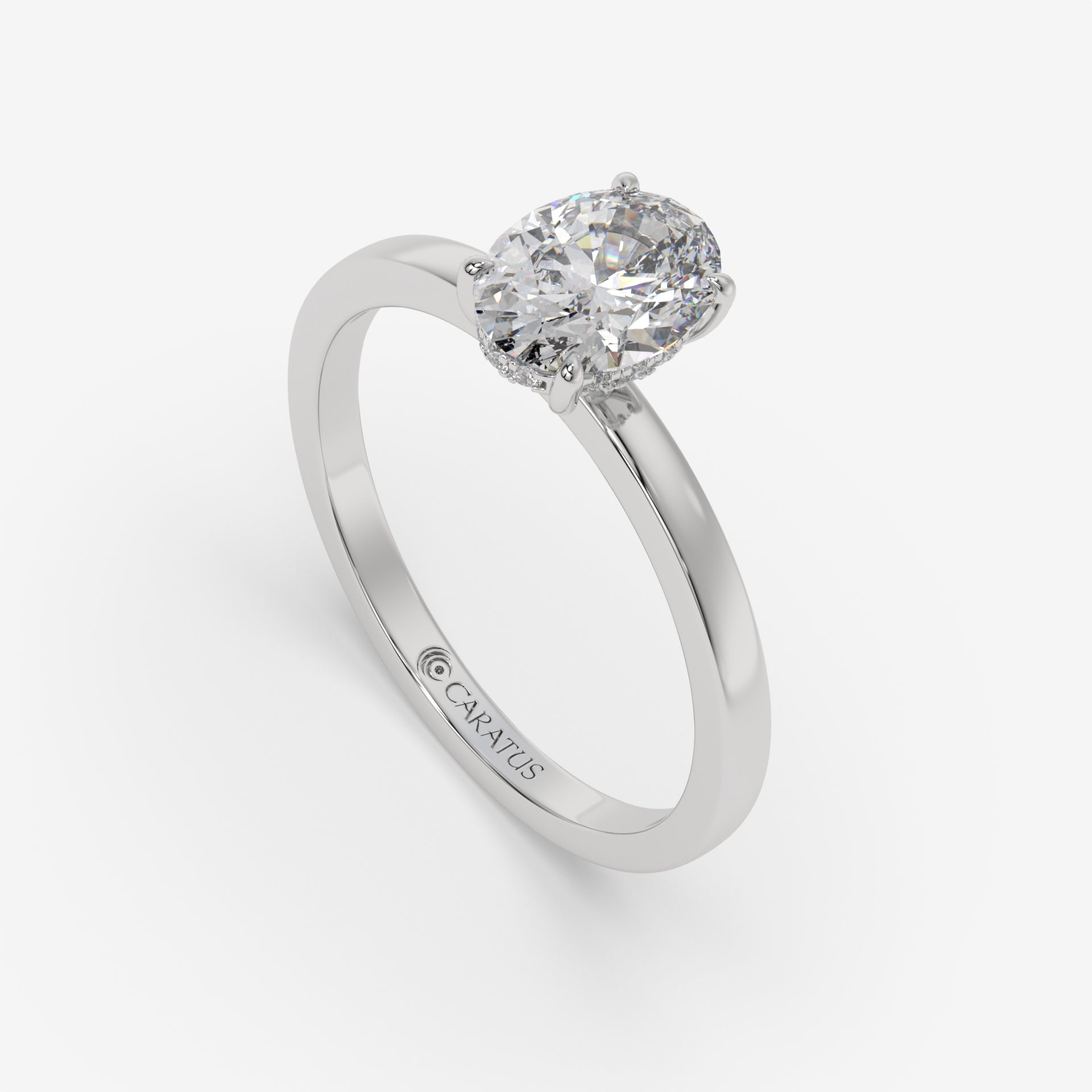 White Gold Oval Diamond Ring with Round Side Stones