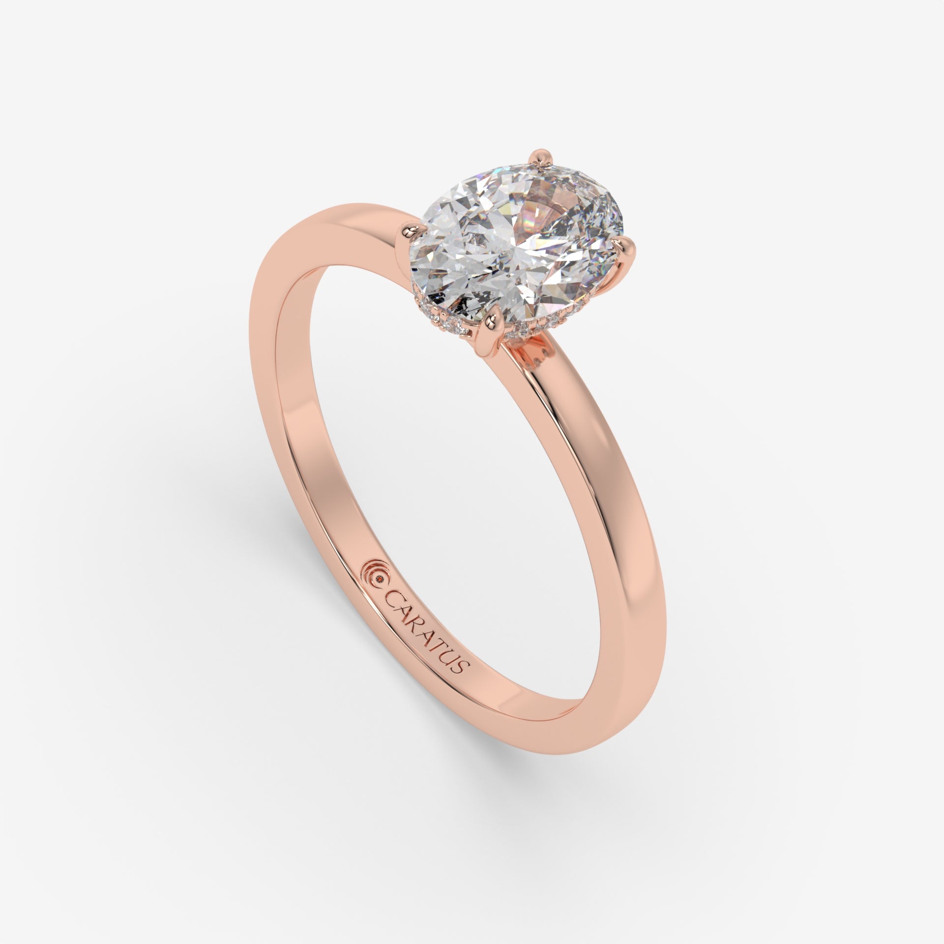 Rose Gold Oval Diamond Ring with Round Side Stones