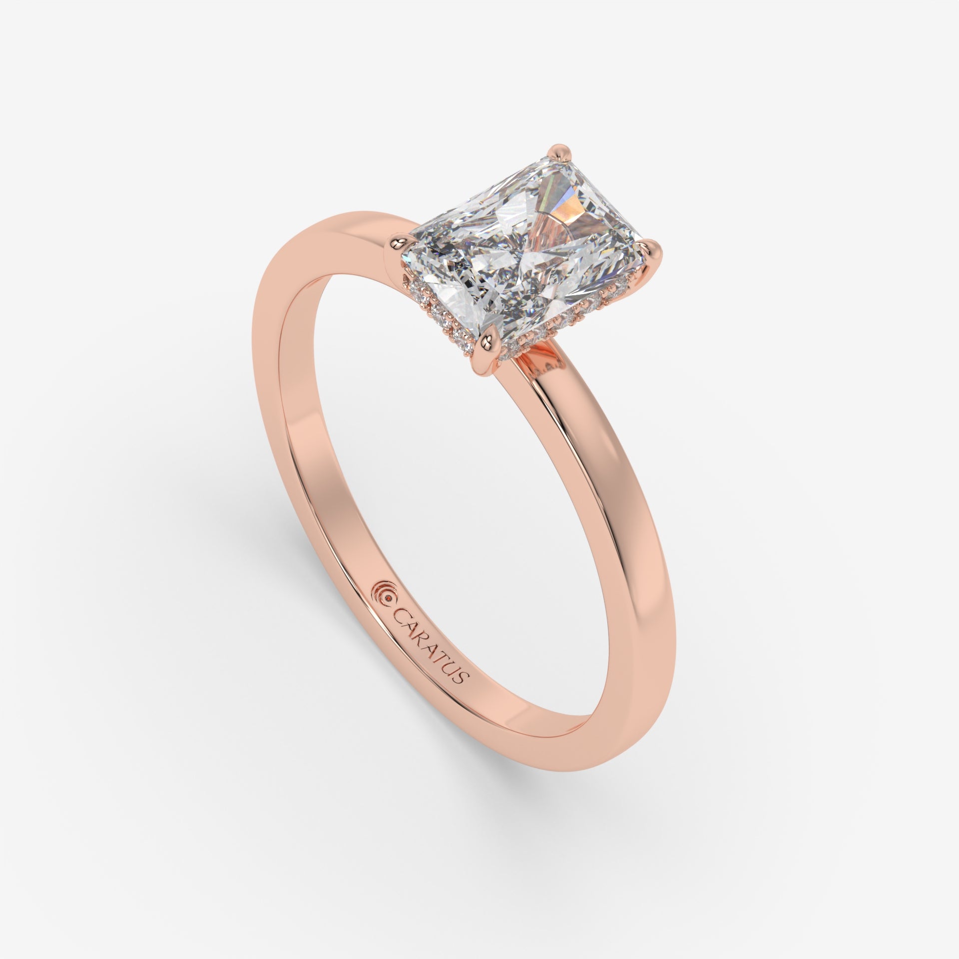 Radiant-cut Diamond Rose Gold Ring with Round Side Diamonds