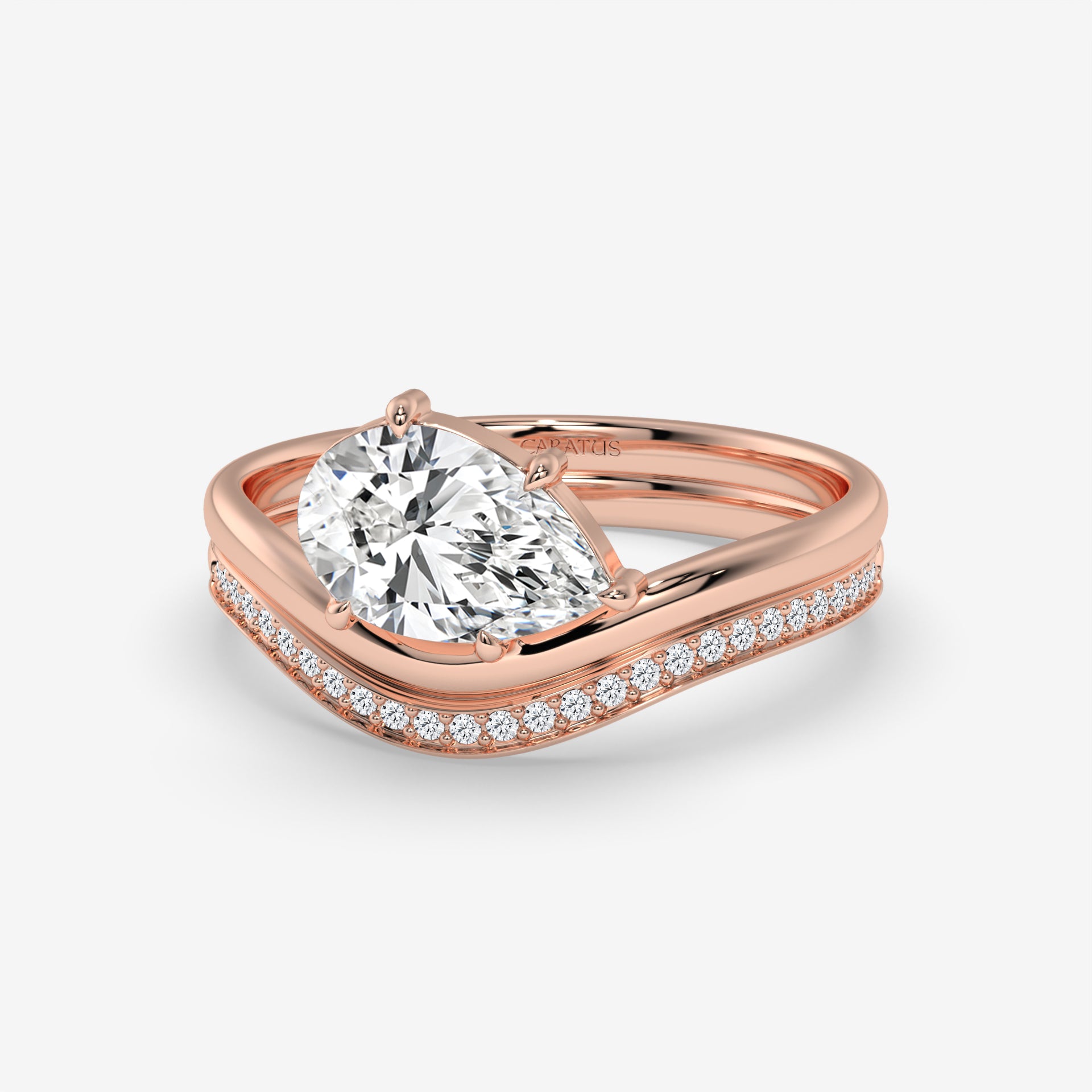 Pear-Shaped Diamond Ring with Round Diamonds in Yellow Gold