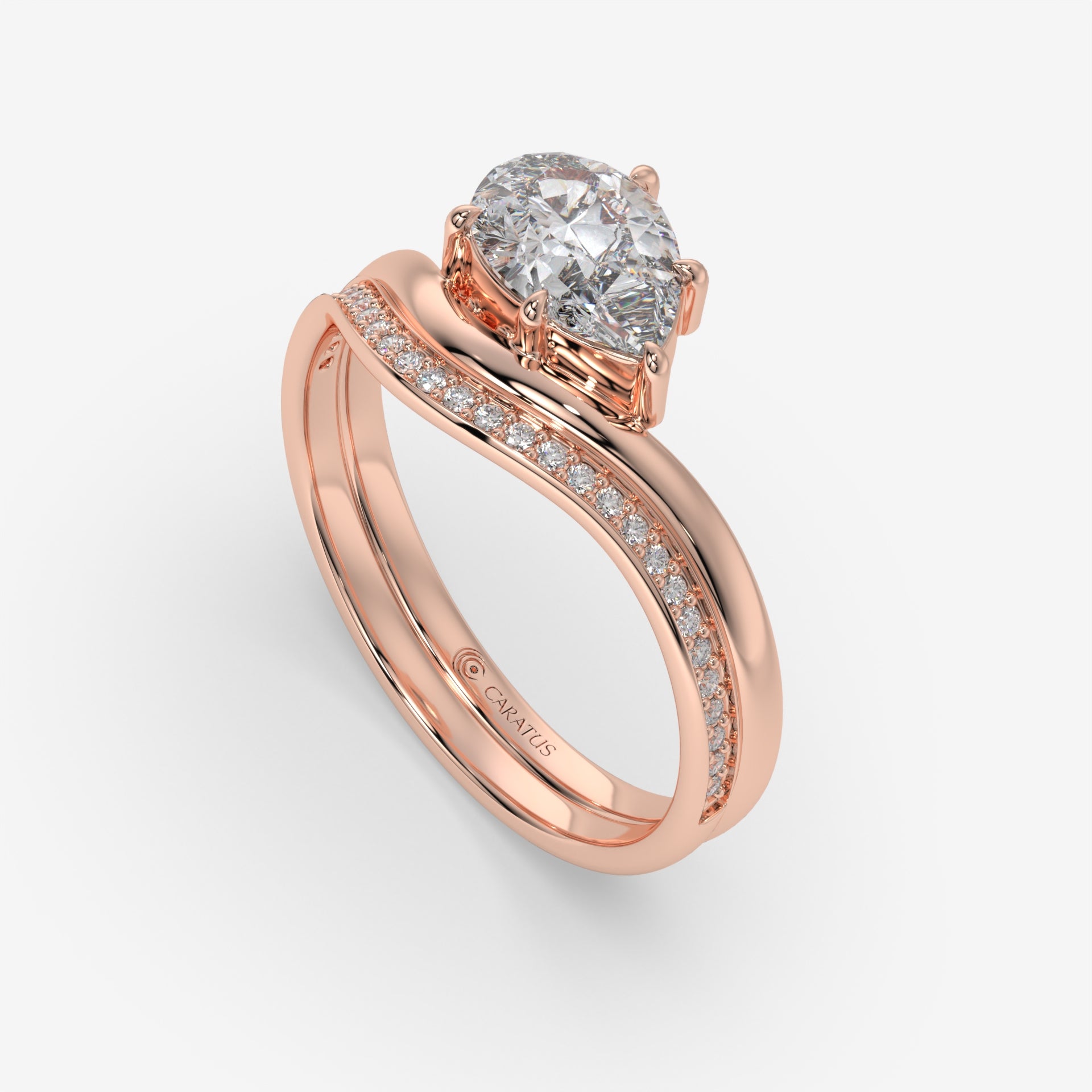 Pear-Shaped Diamond Ring with Round Diamonds in Rose Gold