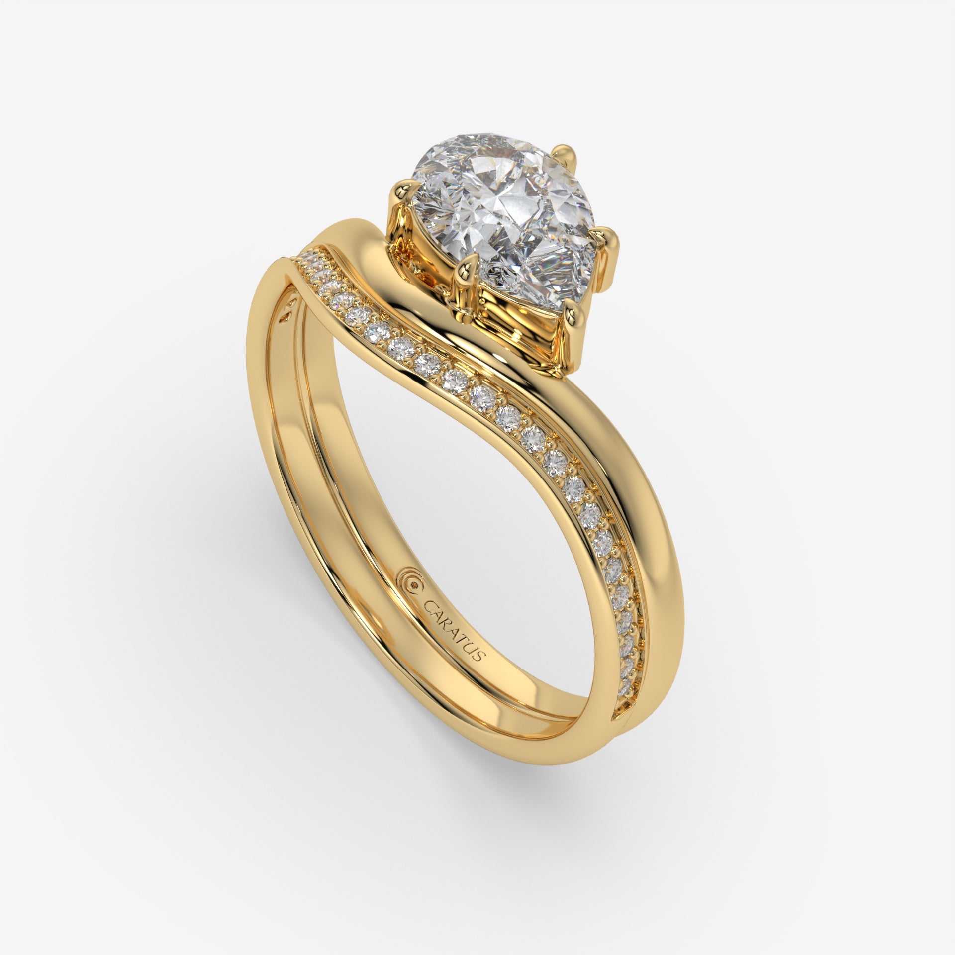 Pear-Shaped Diamond Ring with Round Diamonds in Yellow Gold