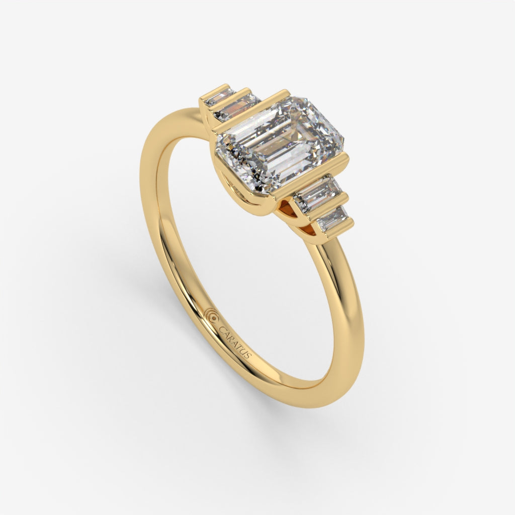 Emerald Cut Diamond Yellow Gold Ring with Randiant baguette-cut diamonds