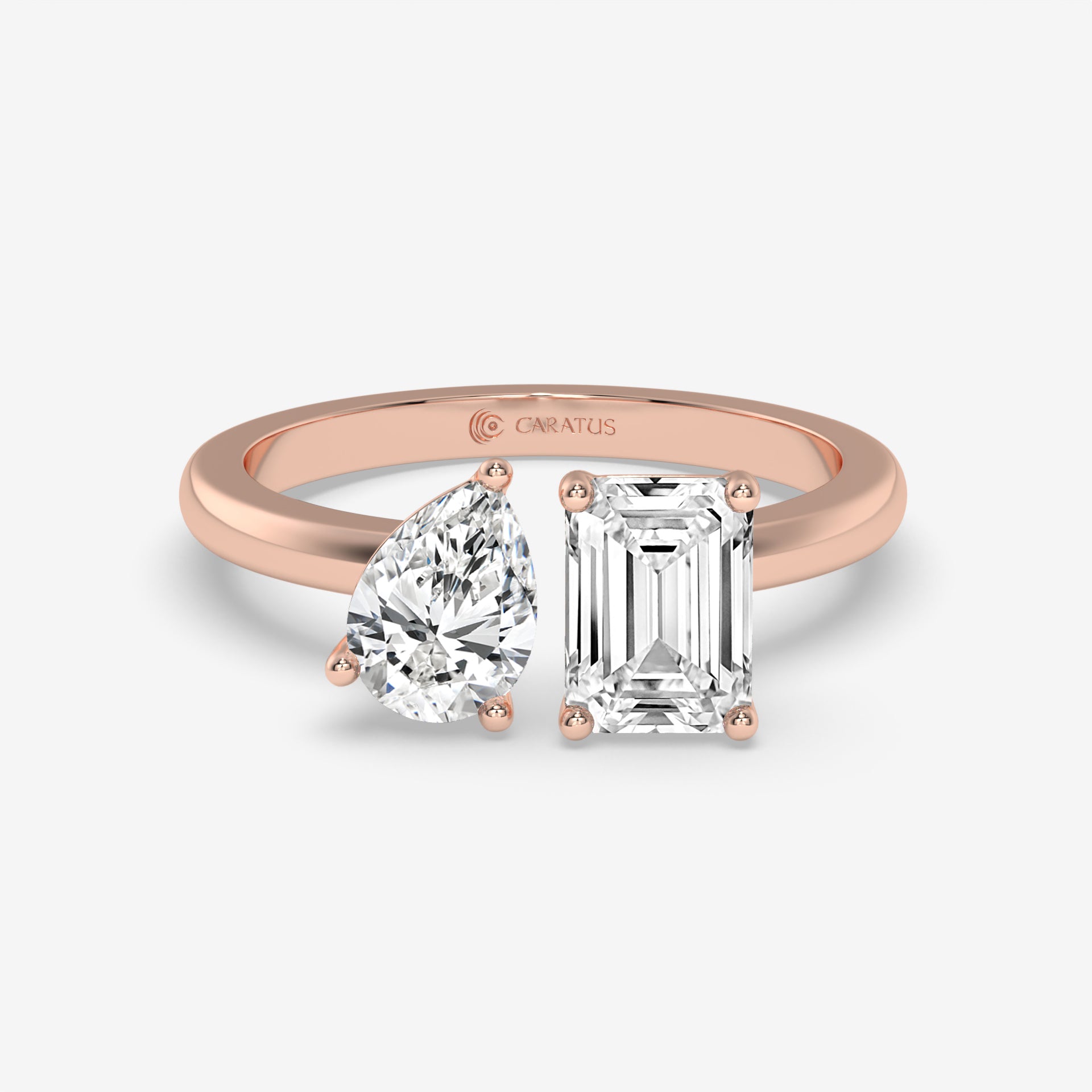 1.00 CT Rose Gold Pear-Cut Engagement Ring with Emerald Side Diamond