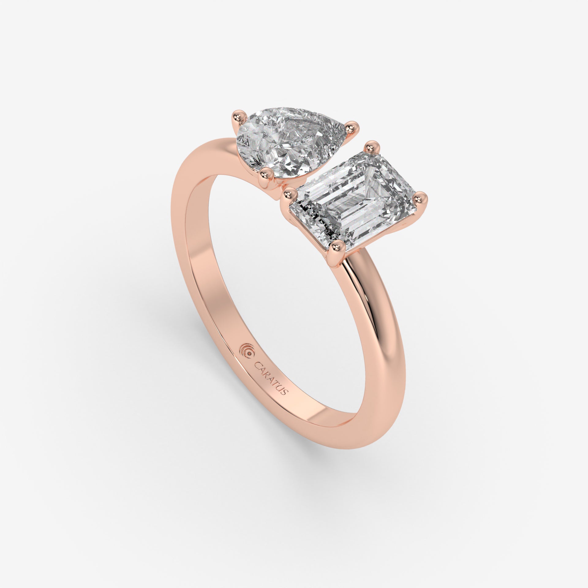 1.00 CT Rose Gold Pear-Cut Engagement Ring with Emerald Side Diamond
