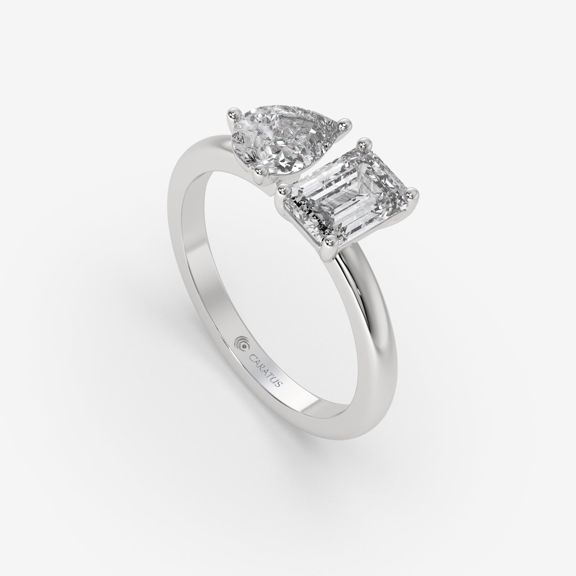 1.00 CT White Gold Pear-Cut Engagement Ring with Emerald Side Diamond