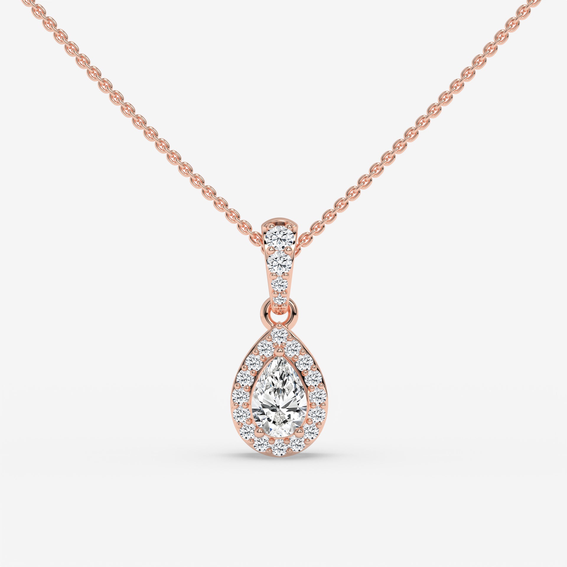 Pear-Shaped Diamond Pendant with Round Diamond Accents in Yellow Gold