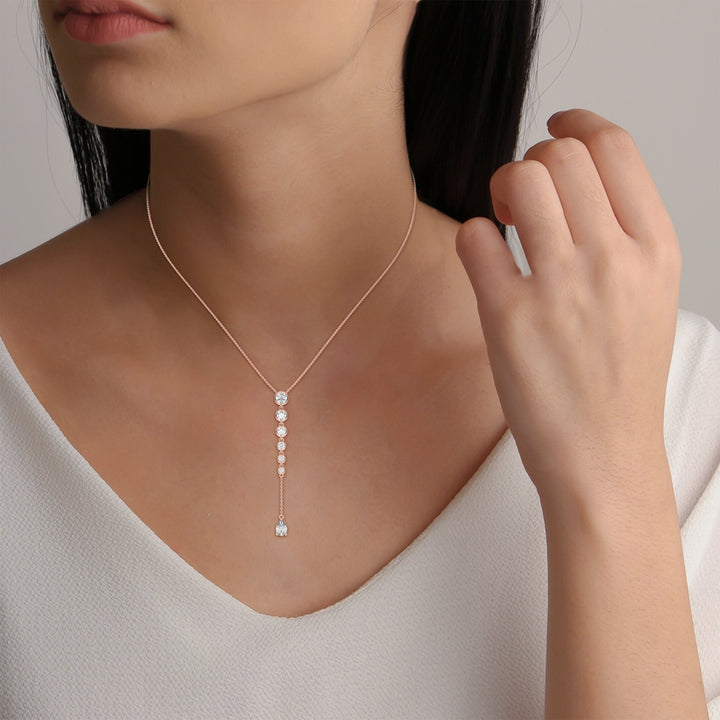 Rose Gold Vertical Diamond Pendant with Pear and Round-Cut Stones