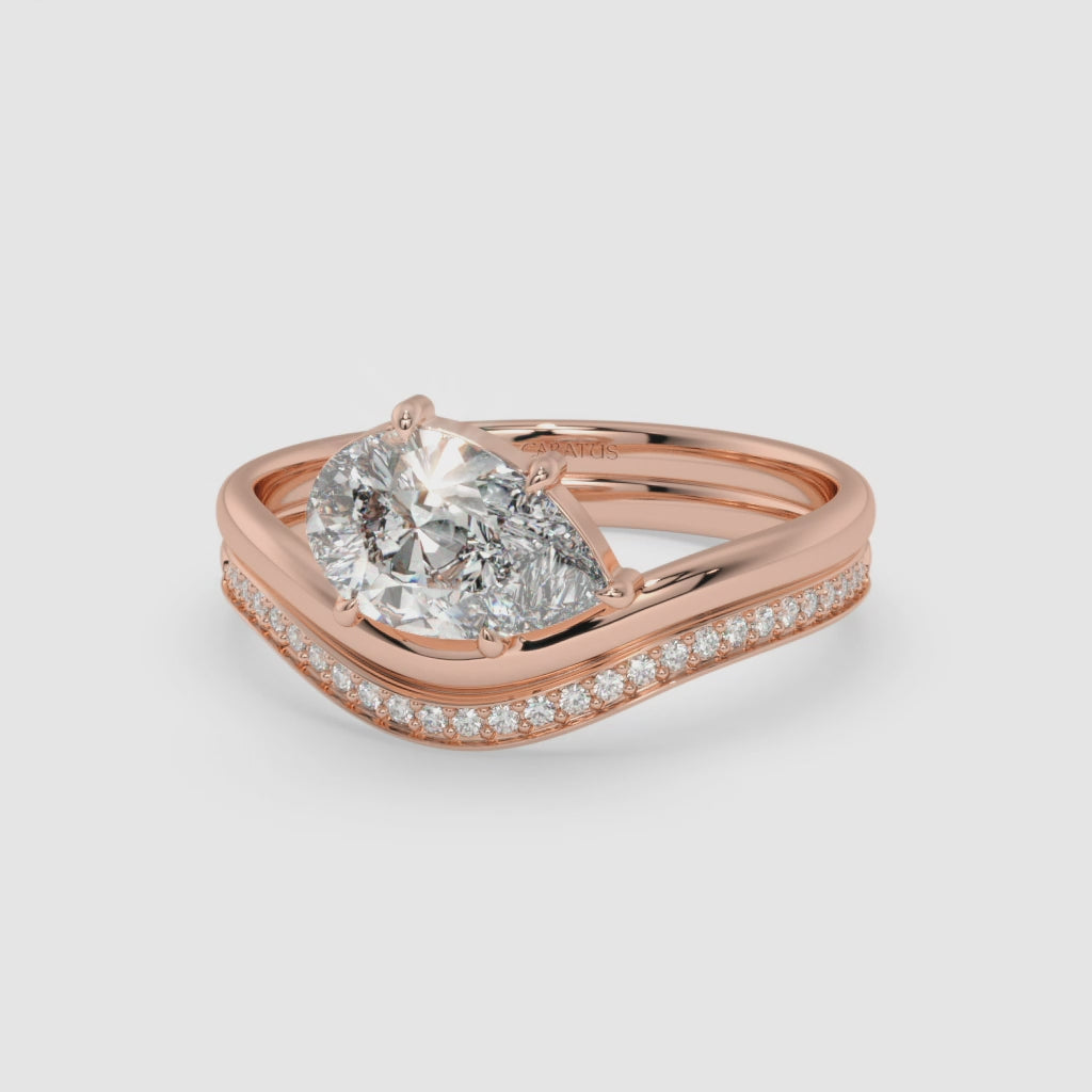 Pear-Shaped Diamond Ring with Round Diamonds in Rose Gold