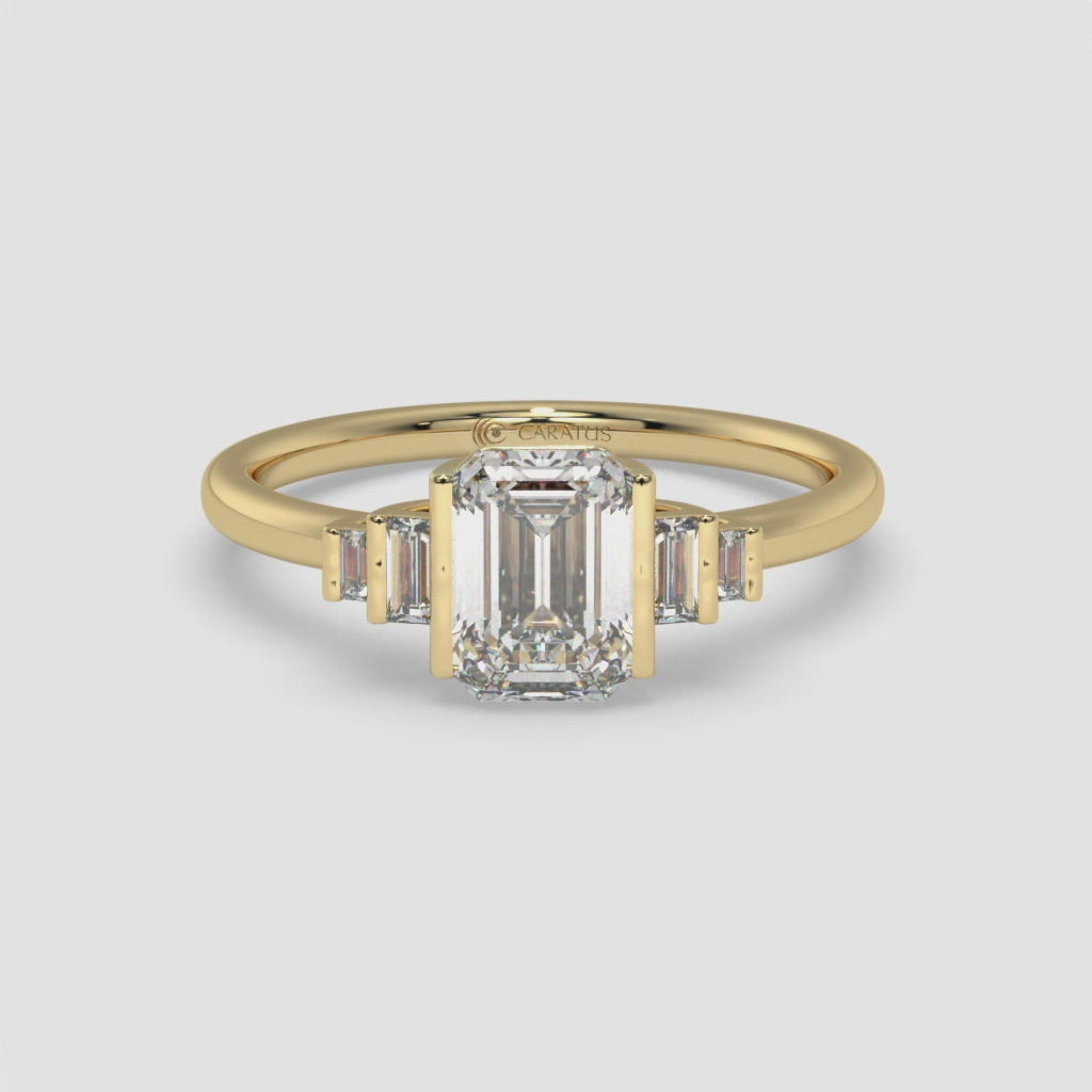 Emerald Cut Diamond Yellow Gold Ring with Randiant baguette-cut diamonds