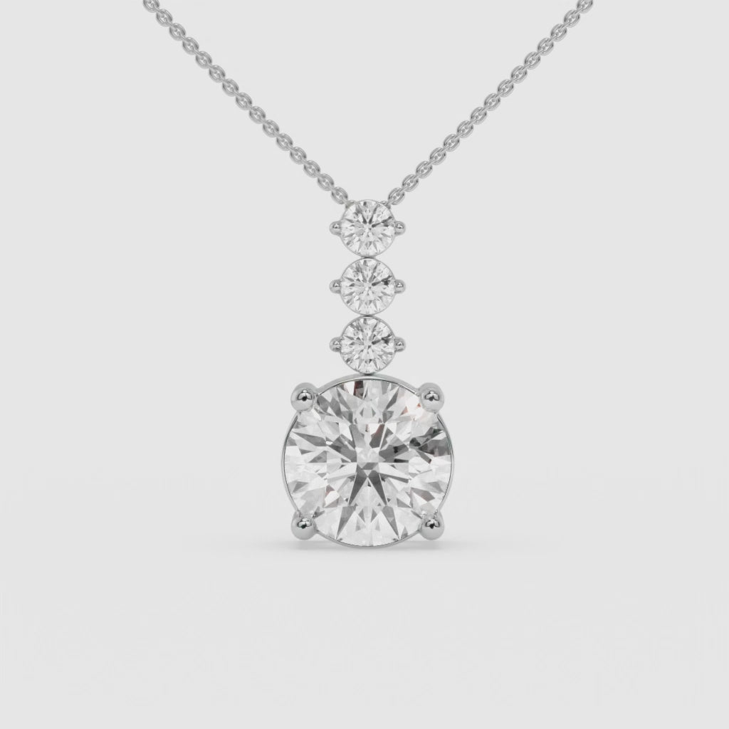 Radiant Three-Stone Round-Cut White Gold Diamond Pendant