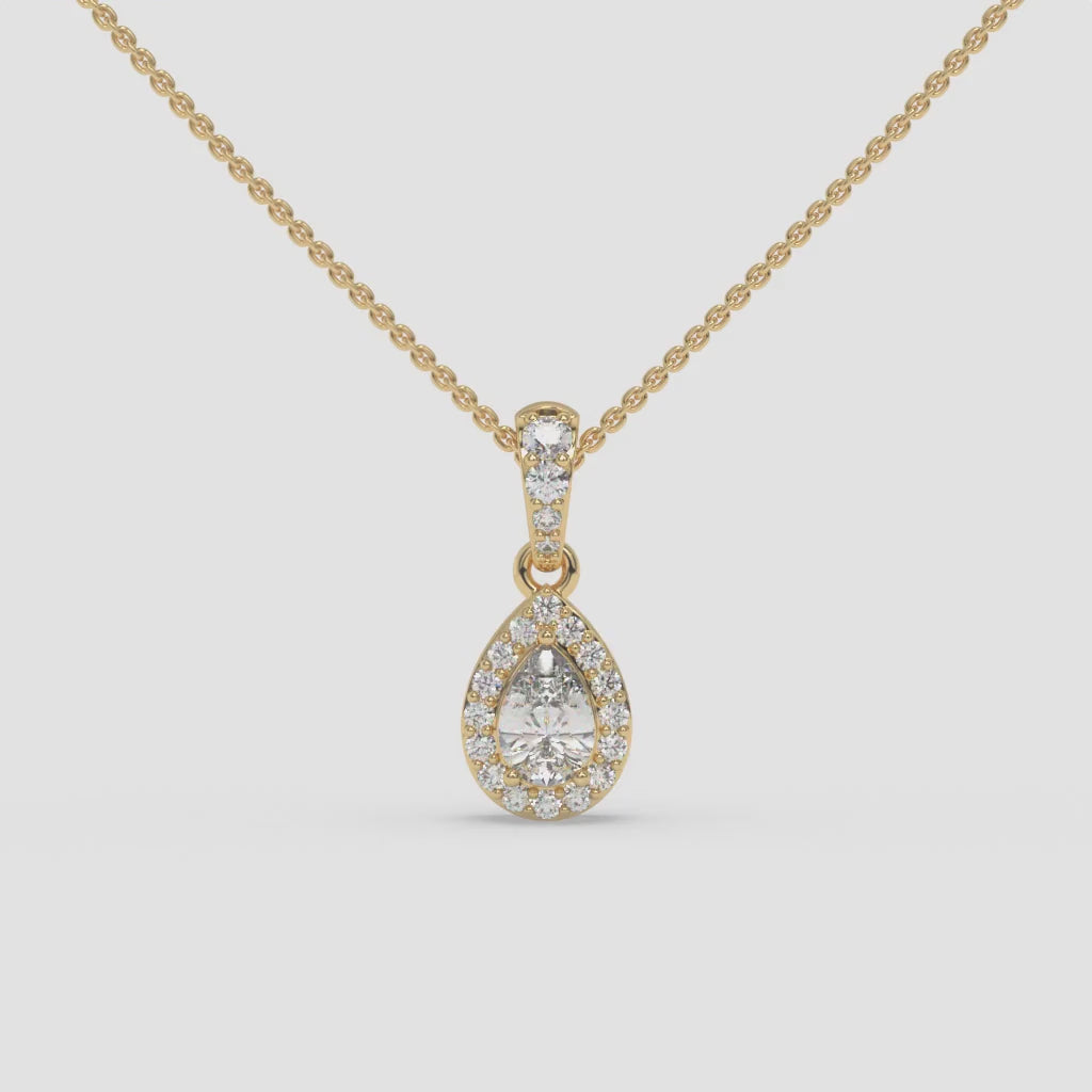Pear-Shaped Diamond Pendant with Round Diamond Accents in Yellow Gold