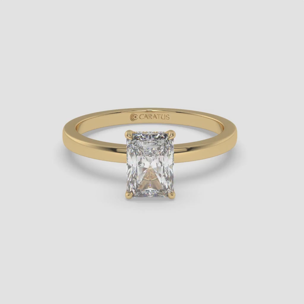 Radiant-cut Diamond Yellow Gold Ring with Round Side Diamonds