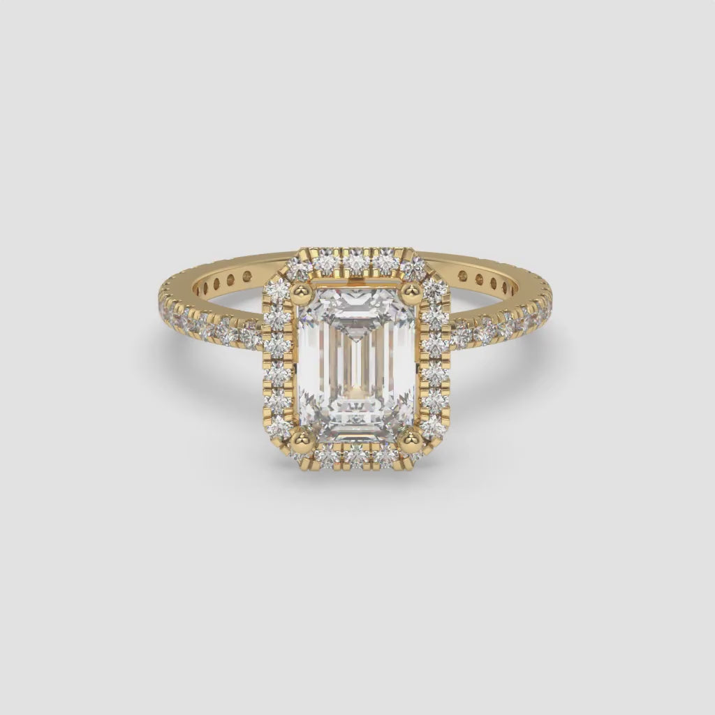 Yellow Gold Emerald-Cut Halo Ring with Round Accent Diamonds