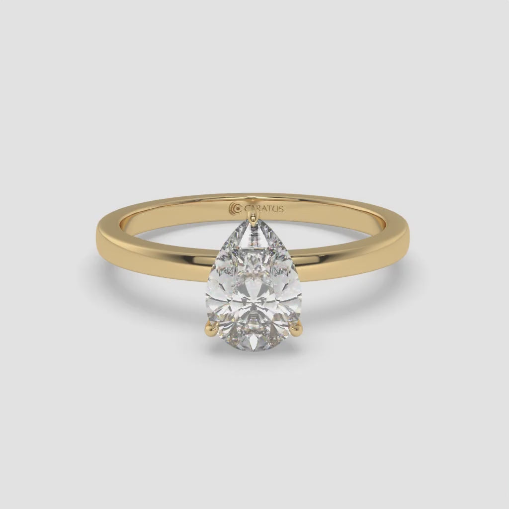 Pear-Shaped Diamond Yellow Gold Ring with Round Diamond Halo