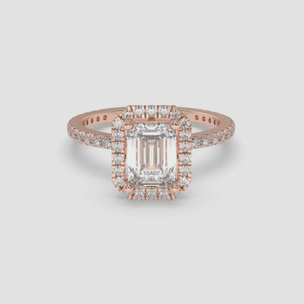 Rose Gold Emerald-Cut Halo Ring with Round Accent Diamonds