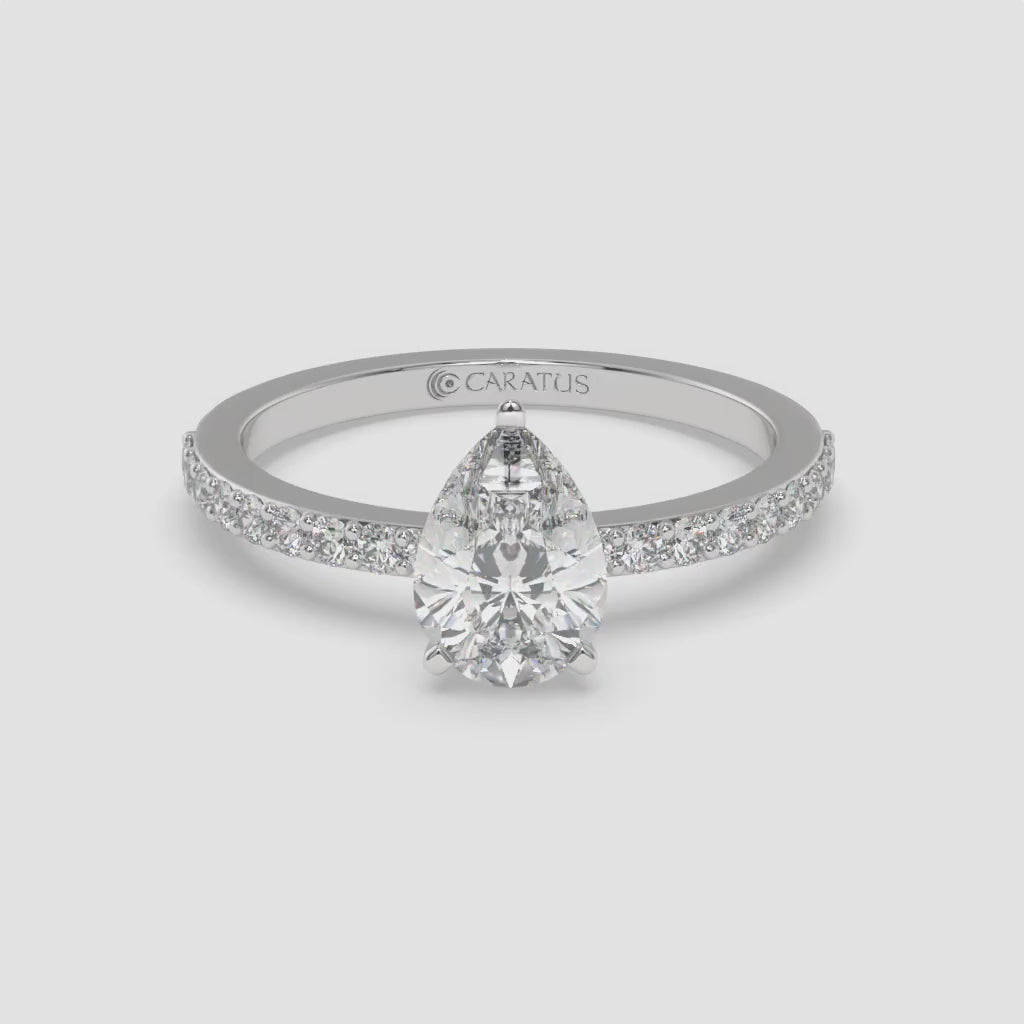 Pear-Shaped Diamond White Gold Ring with Channel Set Band