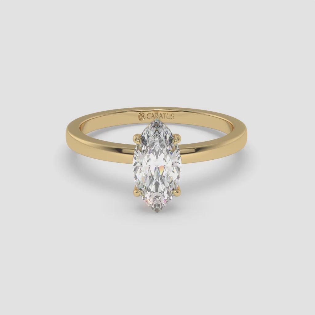 Marquise Diamond Ring with Round Side Diamonds in Yellow Gold