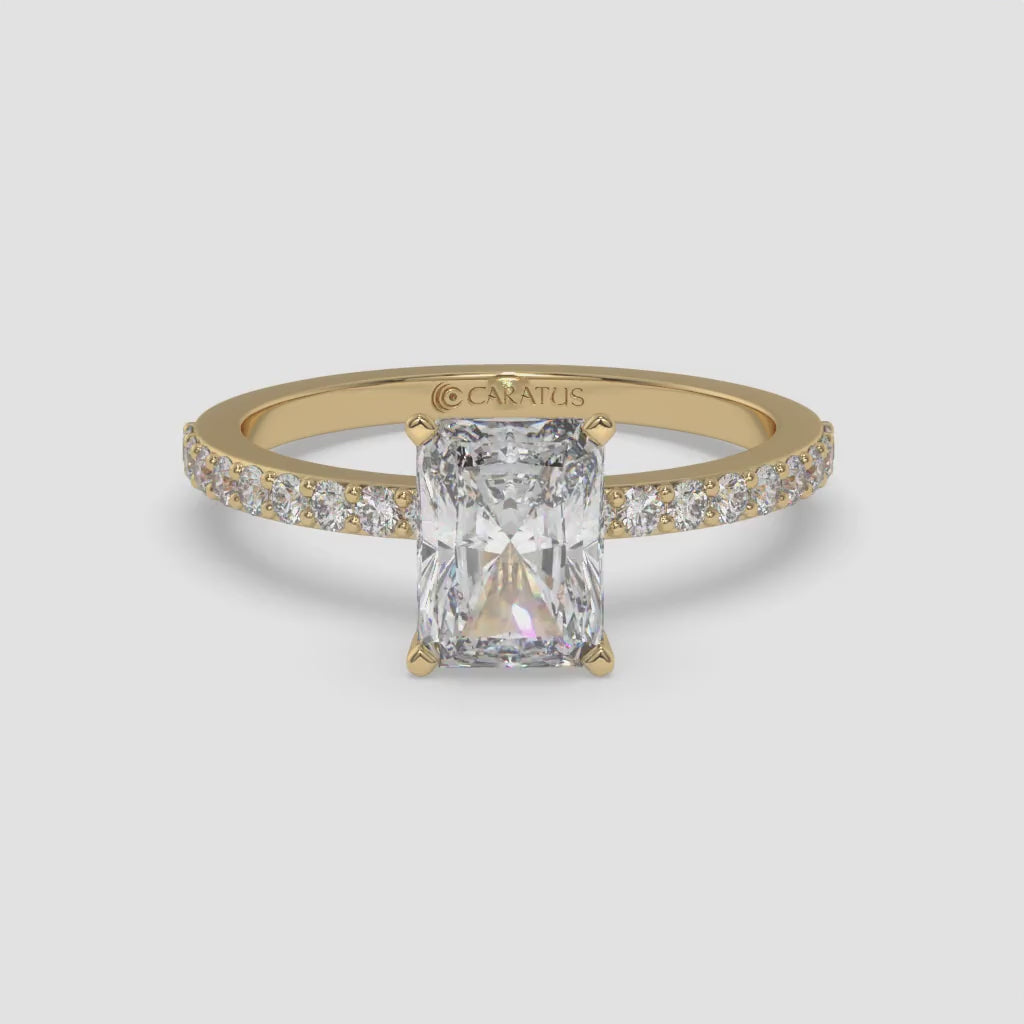 Yellow Gold Radiant-cut Solitaire Ring with Channel-Set Side Diamonds