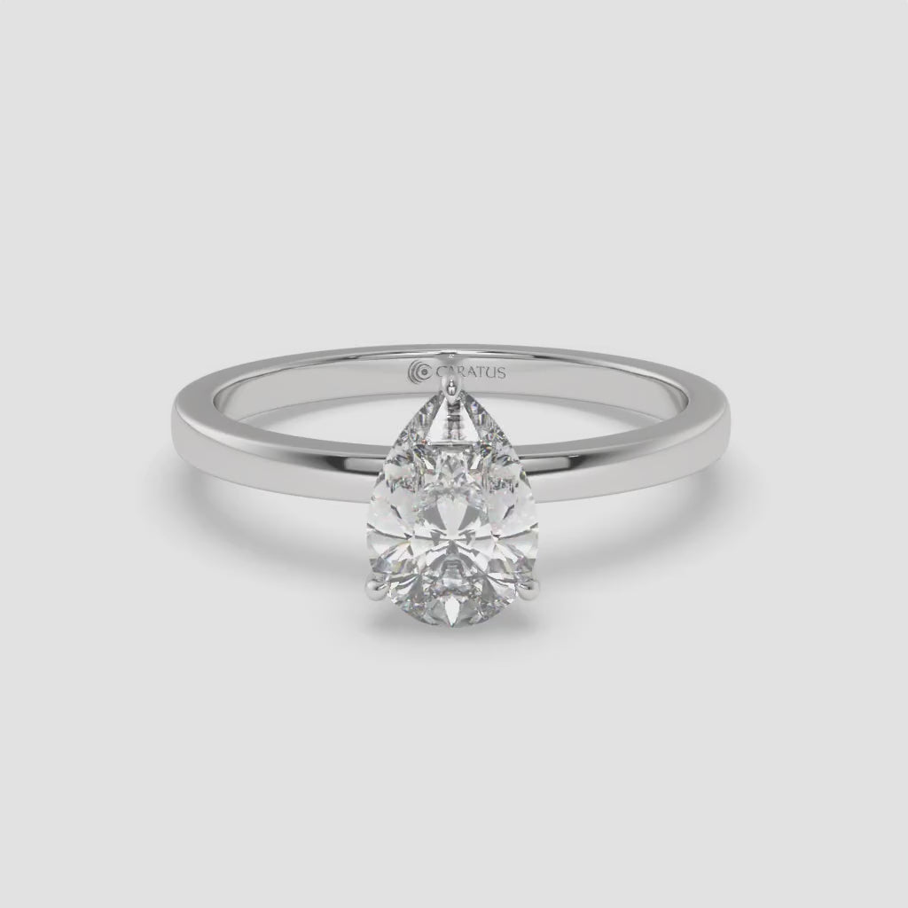 Pear-Shaped Diamond White Gold Ring with Round Diamond Halo