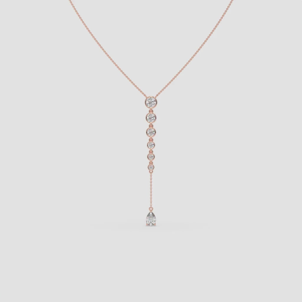 Rose Gold Vertical Diamond Pendant with Pear and Round-Cut Stones
