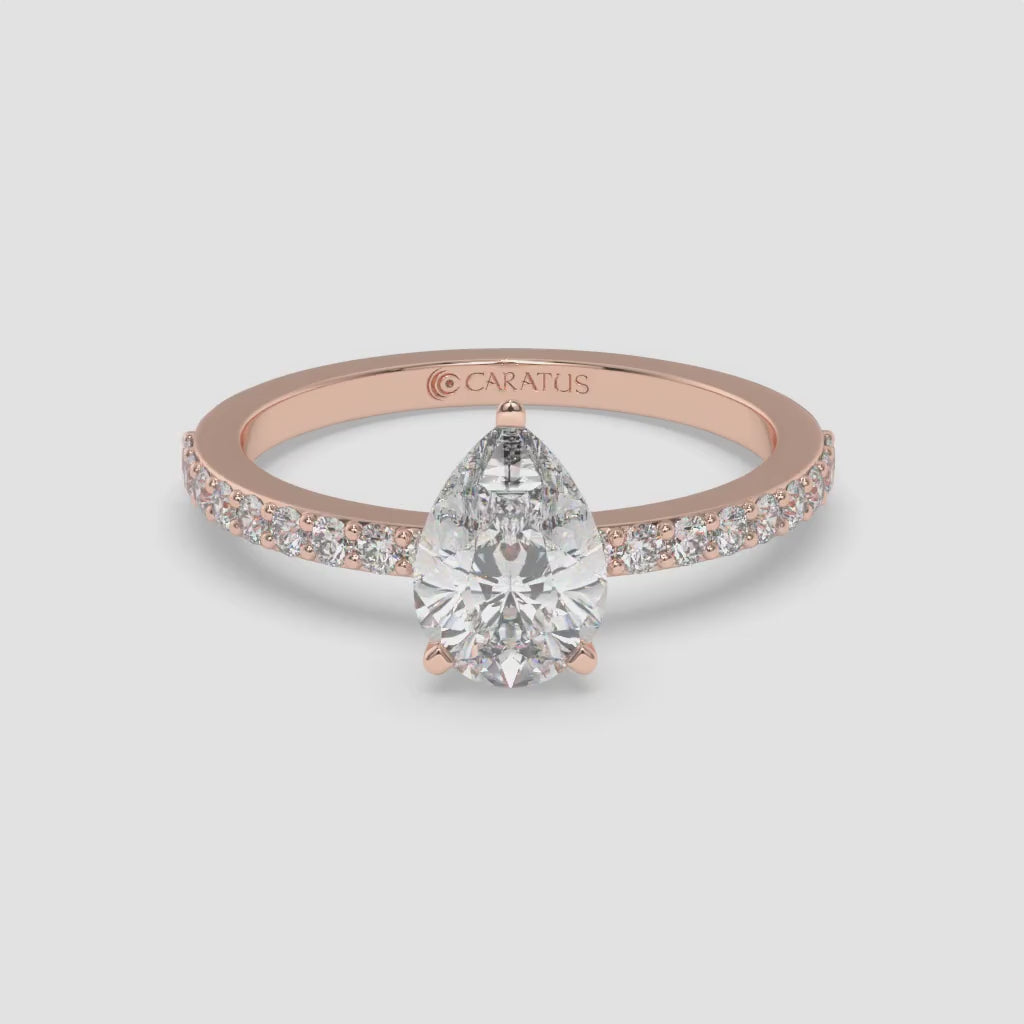 Pear-Shaped Diamond Rose Gold Ring with Channel Set Band