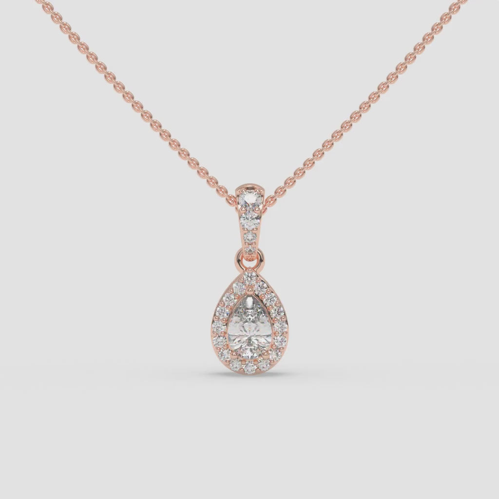 Pear-Shaped Diamond Pendant with Round Diamond Accents in Rose Gold