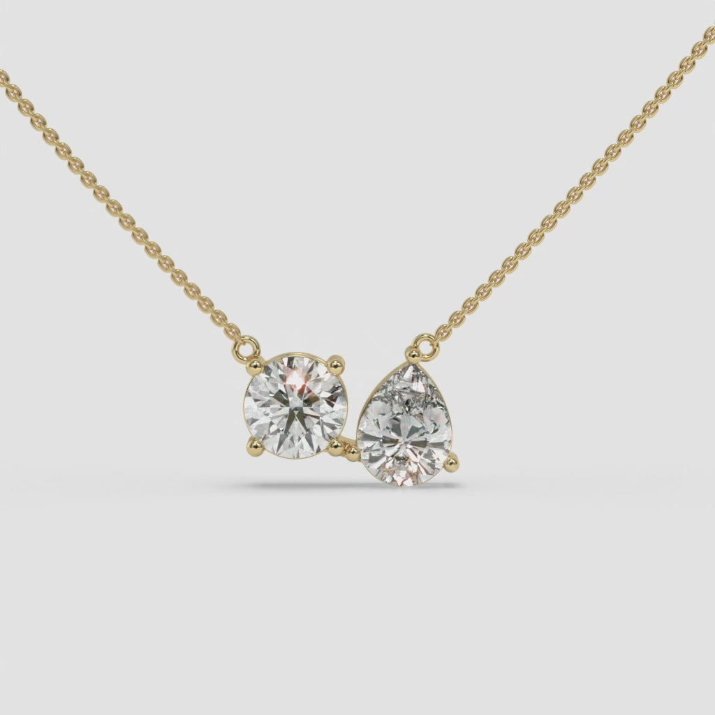 Pear and Round Duet Pendant in Yellow Gold