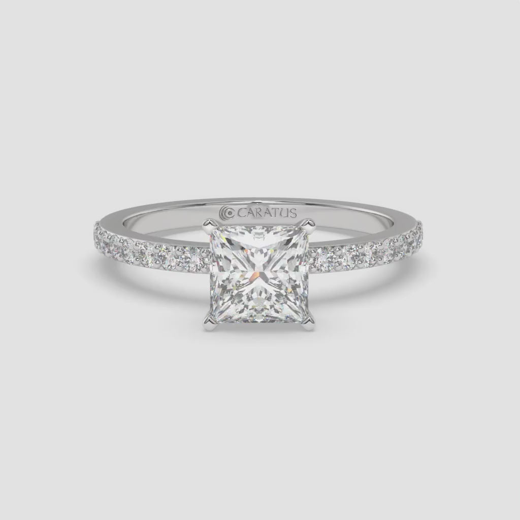 White Gold Princess-Cut Diamond Solitaire Ring with Channel-Set Band