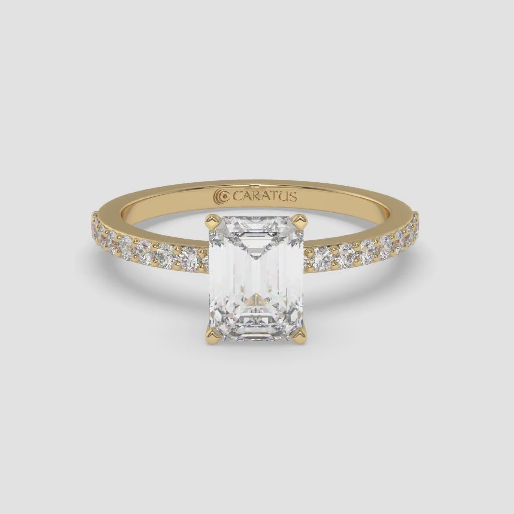 Emerald-cut diamond Yellow Gold Ring with Channel-Set Band