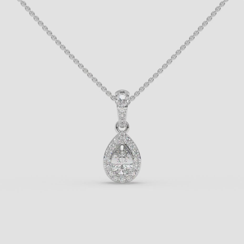 Pear-Shaped Diamond Pendant with Round Diamond Accents in White Gold