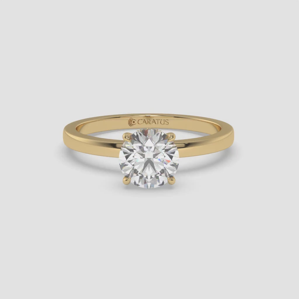 Round Diamond Ring with Accent Diamonds in Yellow Gold