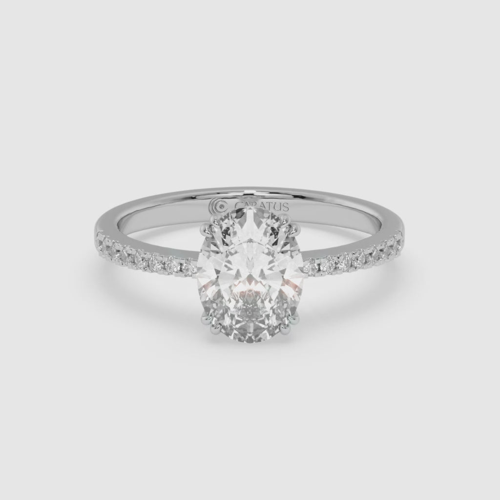 White Gold Oval-Cut Diamond Pavé Ring with Radiant Sparkle