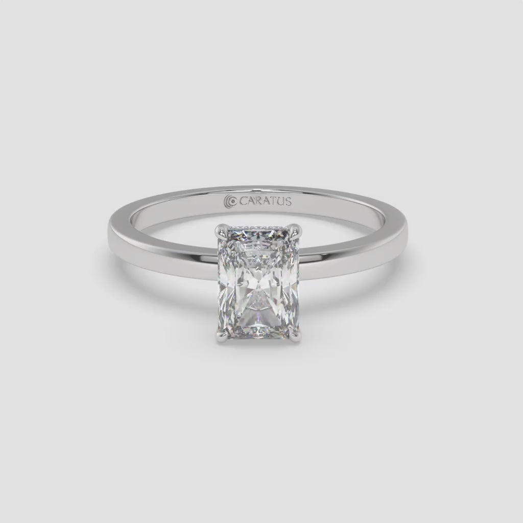 Radiant-cut Diamond White Gold Ring with Round Side Diamonds