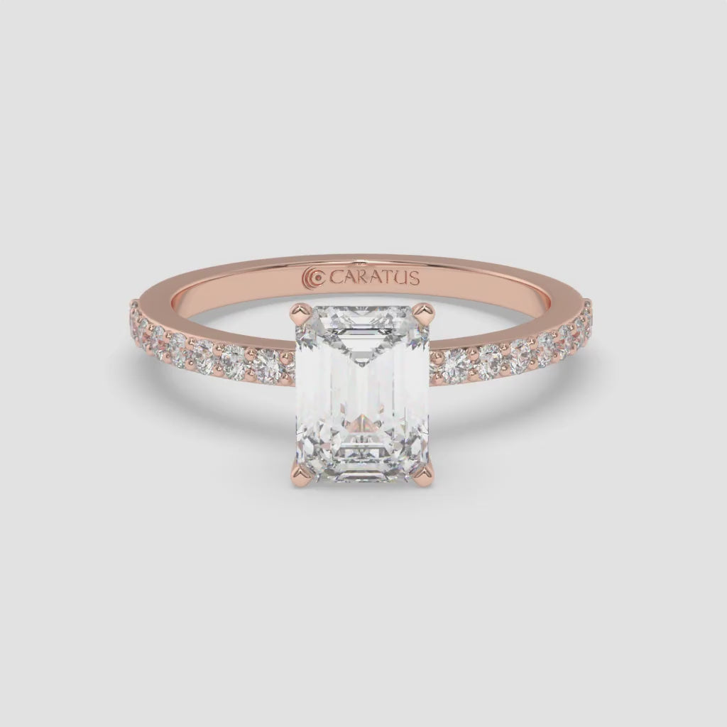 Emerald-cut diamond Rose Gold Ring with Channel-Set Band