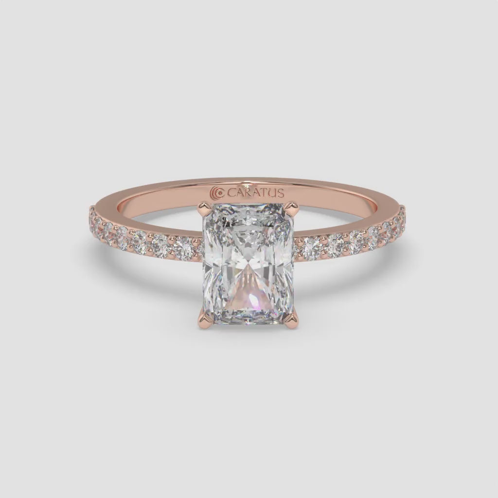 Rose Gold Radiant-cut Solitaire Ring with Channel-Set Side Diamonds