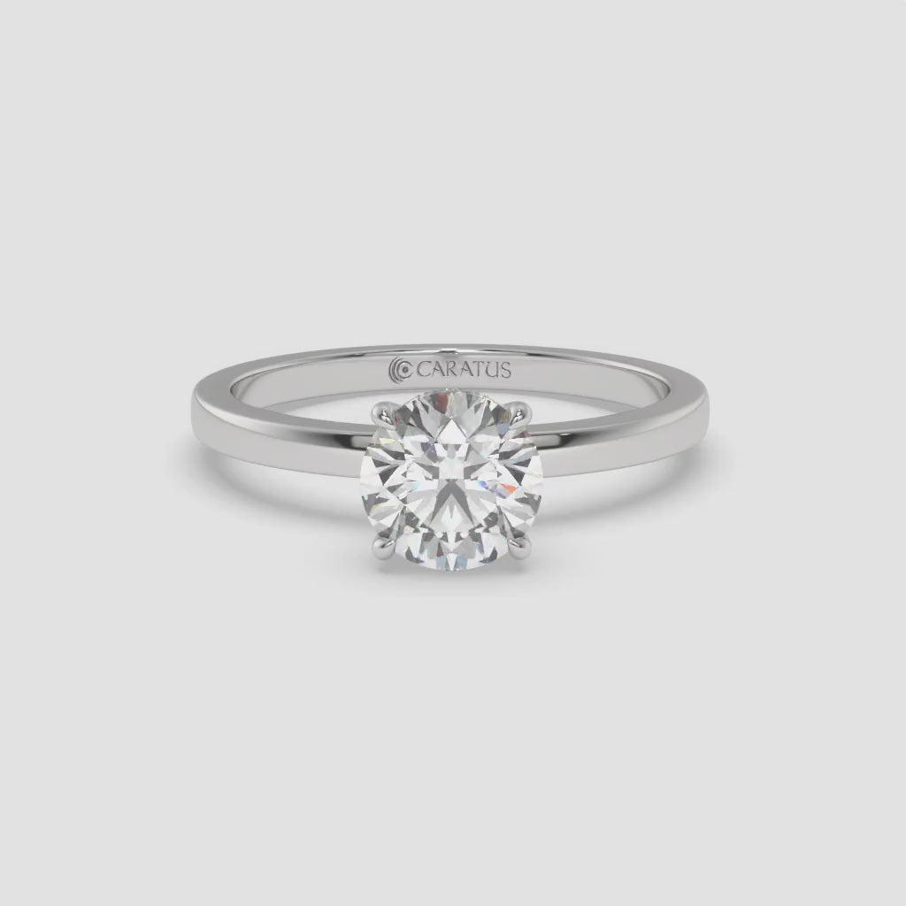 Round Diamond Ring with Accent Diamonds in White Gold